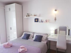 Posteľ alebo postele v izbe v ubytovaní Apartments Sv.Jakov