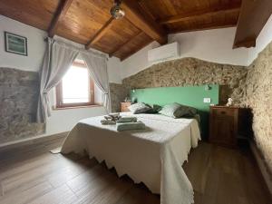 Postel nebo postele na pokoji v ubytování B&B IL VOLO