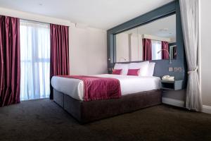 Voodi või voodid majutusasutuse Claregalway Hotel toas