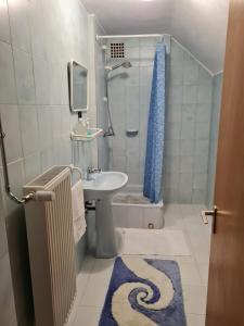Kúpeľňa v ubytovaní Gyöngyvirág Apartman Lenti + 23 fotografií
