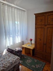 Posteľ alebo postele v izbe v ubytovaní Gyöngyvirág Apartman Lenti