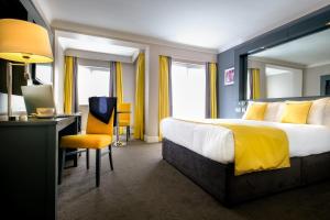 Voodi või voodid majutusasutuse Claregalway Hotel toas