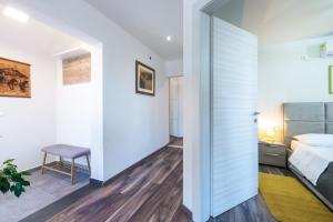 Posteľ alebo postele v izbe v ubytovaní Apartment Exclusive Nia