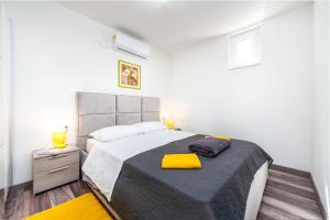 Posteľ alebo postele v izbe v ubytovaní Apartment Exclusive Nia