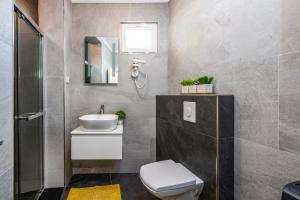 Kúpeľňa v ubytovaní Apartment Exclusive Nia