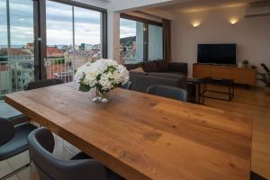 Televízia a/alebo spoločenská miestnosť v ubytovaní Luxury apartment Ivari