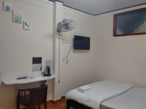 TV a/nebo společenská místnost v ubytování Minh Toàn Homestay + 20 fotografií