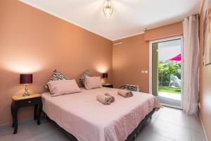 a bedroom with a bed and a large window at Residence Blue Harmony in Nice