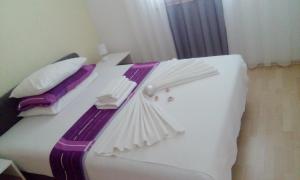 Postel nebo postele na pokoji v ubytování Apartman Grlić Obiteljski odmor