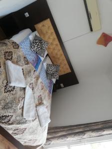 Postel nebo postele na pokoji v ubytování Vila Ariana