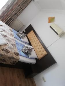 Postel nebo postele na pokoji v ubytování Vila Ariana