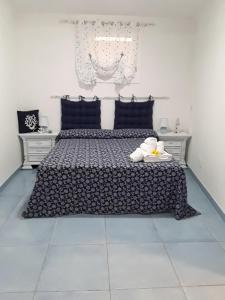 A bed or beds in a room at Da Lucia - Alloggio turistico Santa Maria