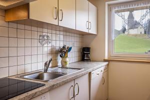 Kuchyň nebo kuchyňský kout v ubytování Ferienwohnung Zirme Gasser