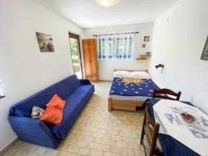 Ένα ή περισσότερα κρεβάτια σε δωμάτιο στο Apartmani Nadica