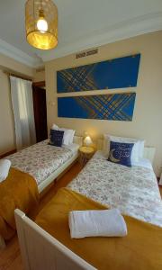 Ένα ή περισσότερα κρεβάτια σε δωμάτιο στο Casa en las Termas de Amador de los Ríos