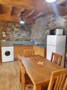 Kuchyň nebo kuchyňský kout v ubytování Apartamentos C'Ambrosio