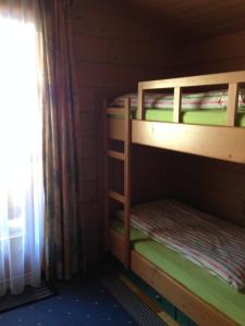 A bed or beds in a room at Appartement Sonnberg