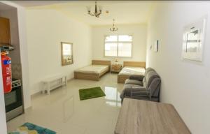 Posezení v ubytování Furnished Studio Apartments for rent in Dubai