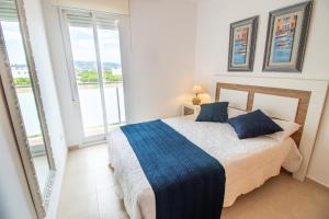 Posteľ alebo postele v izbe v ubytovaní Apartamento Romero valencia
