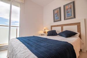 Posteľ alebo postele v izbe v ubytovaní Apartamento Romero valencia