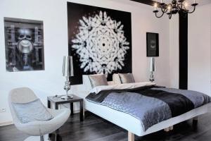 En eller flere senge i et værelse på Artrooms