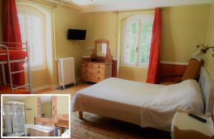 a bedroom with a bed and a dresser and windows at La Garenne de Morestel in Morestel