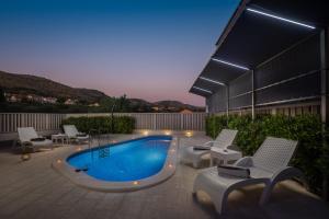 Bazén v ubytování Villa Kami - 4 stars villa, Heated pool nebo v jeho okolí