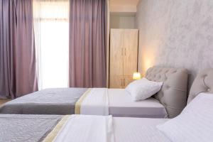 Voodi või voodid majutusasutuse Hotel Rustaveli toas