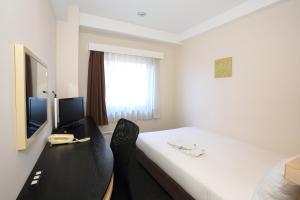 Телевизор и/или развлекательный центр в Smile Hotel Kyoto Shijo