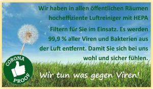 a flyer with a picture of a dandelion in a field at Hotel Rothenburger Hof in Rothenburg ob der Tauber
