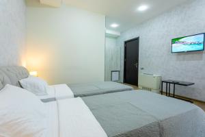 Voodi või voodid majutusasutuse Hotel Rustaveli toas
