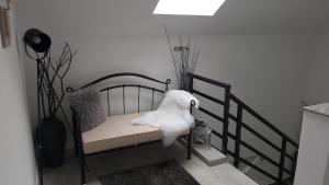 Postel nebo postele na pokoji v ubytování Studio apartman GRIZZLY
