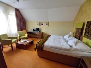 Ένα ή περισσότερα κρεβάτια σε δωμάτιο στο Hotel BELASSI
