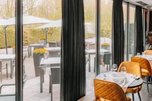 Et opholdsområde på Fletcher Hotel-Restaurant Zevenbergen-Moerdijk