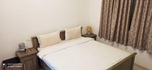 Postel nebo postele na pokoji v ubytování Furnished Studio Apartments for rent in Dubai