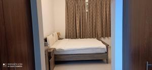 Postel nebo postele na pokoji v ubytování Furnished Studio Apartments for rent in Dubai