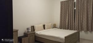 Postel nebo postele na pokoji v ubytování Furnished Studio Apartments for rent in Dubai