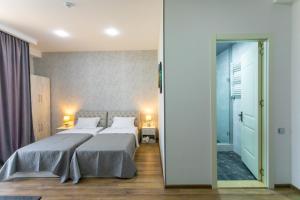 Voodi või voodid majutusasutuse Hotel Rustaveli toas