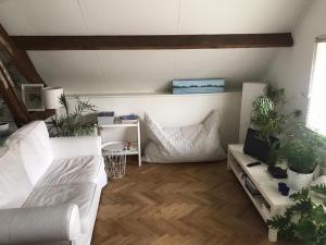 Postel nebo postele na pokoji v ubytování B&B In de Oude Smederij Zaltbommel
