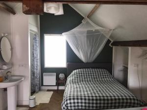 Postel nebo postele na pokoji v ubytování B&B In de Oude Smederij Zaltbommel