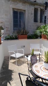 A balcony or terrace at B&B DIMORA PALMIERI