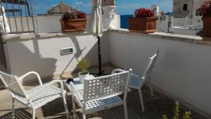 A balcony or terrace at B&B DIMORA PALMIERI