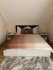 Letto o letti in una camera di Miseta Apartman