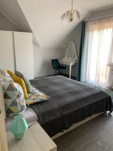 Letto o letti in una camera di Miseta Apartman