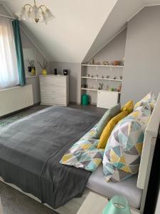 Letto o letti in una camera di Miseta Apartman