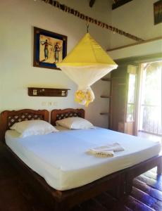 Кровать или кровати в номере Hotel Les Boucaniers