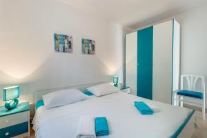 Postel nebo postele na pokoji v ubytování Apartmani Tanja