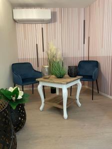 Posezení v ubytování Hotel La Perla