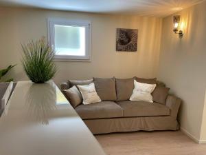 Posezení v ubytování Hotel La Perla