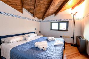 Postel nebo postele na pokoji v ubytování Casa Francesca